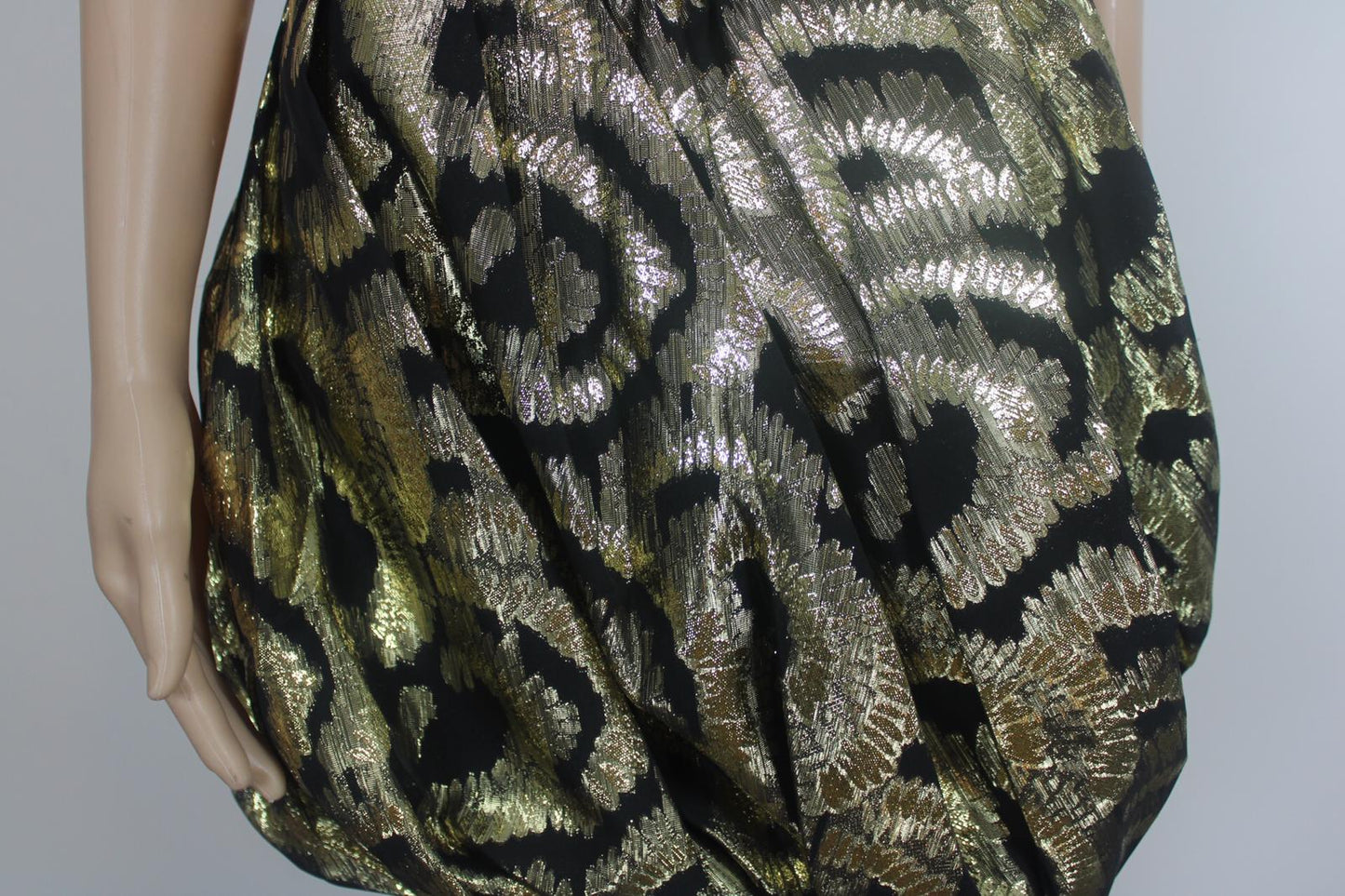 Metallic gold mini skirt