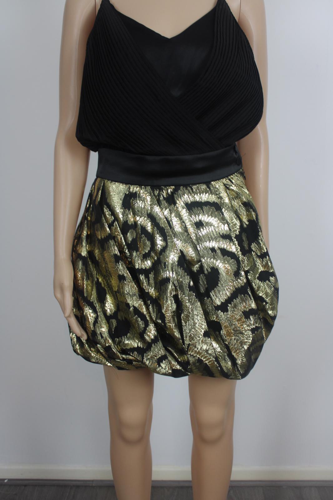Metallic gold mini skirt