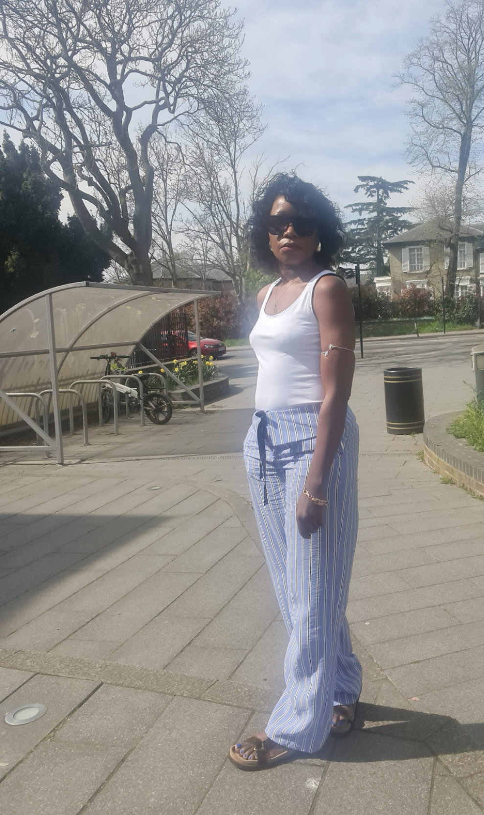 Stripped trousers with turn down waist