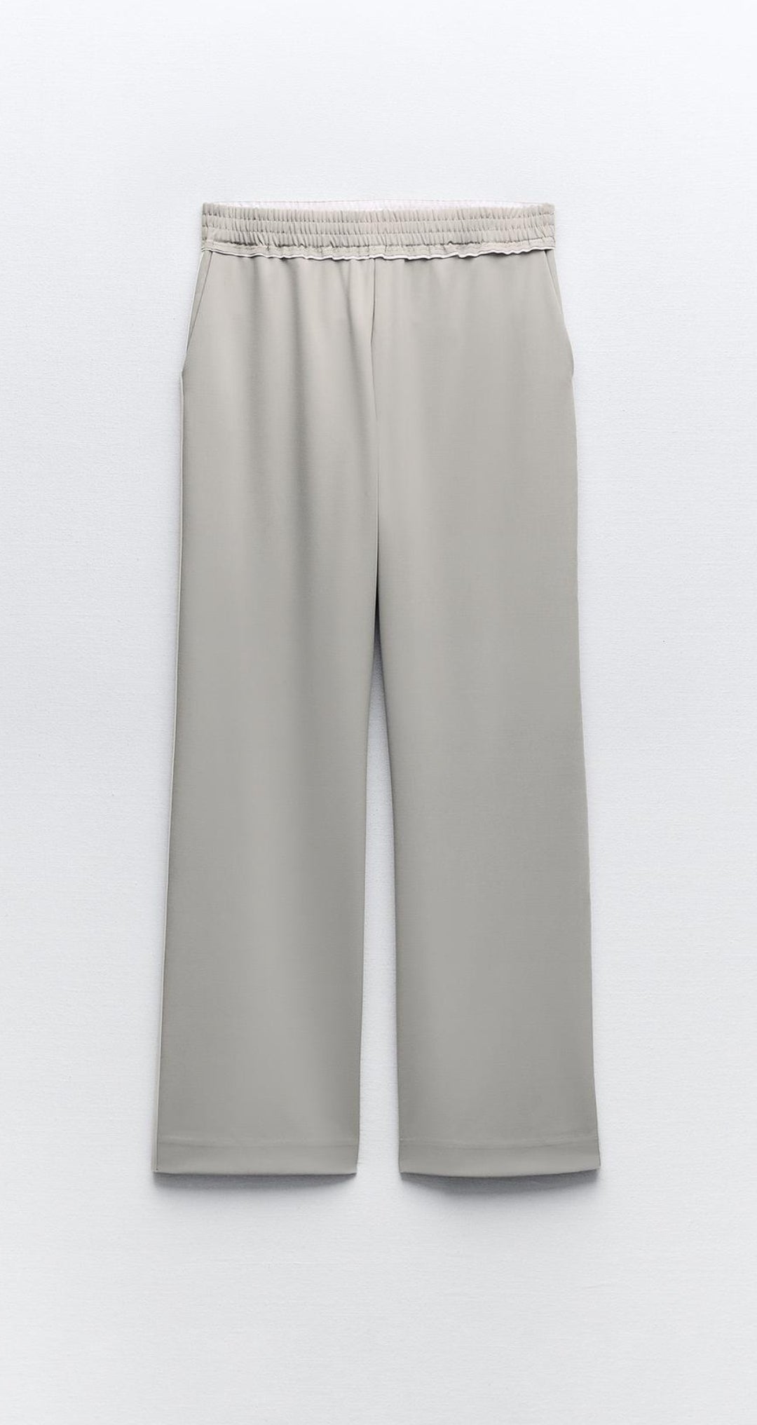 Trousers with side taping