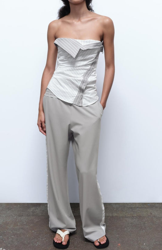 Trousers with side taping