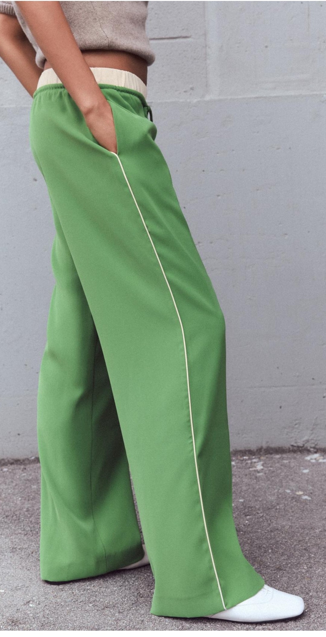 Draw string trousers with side pipping