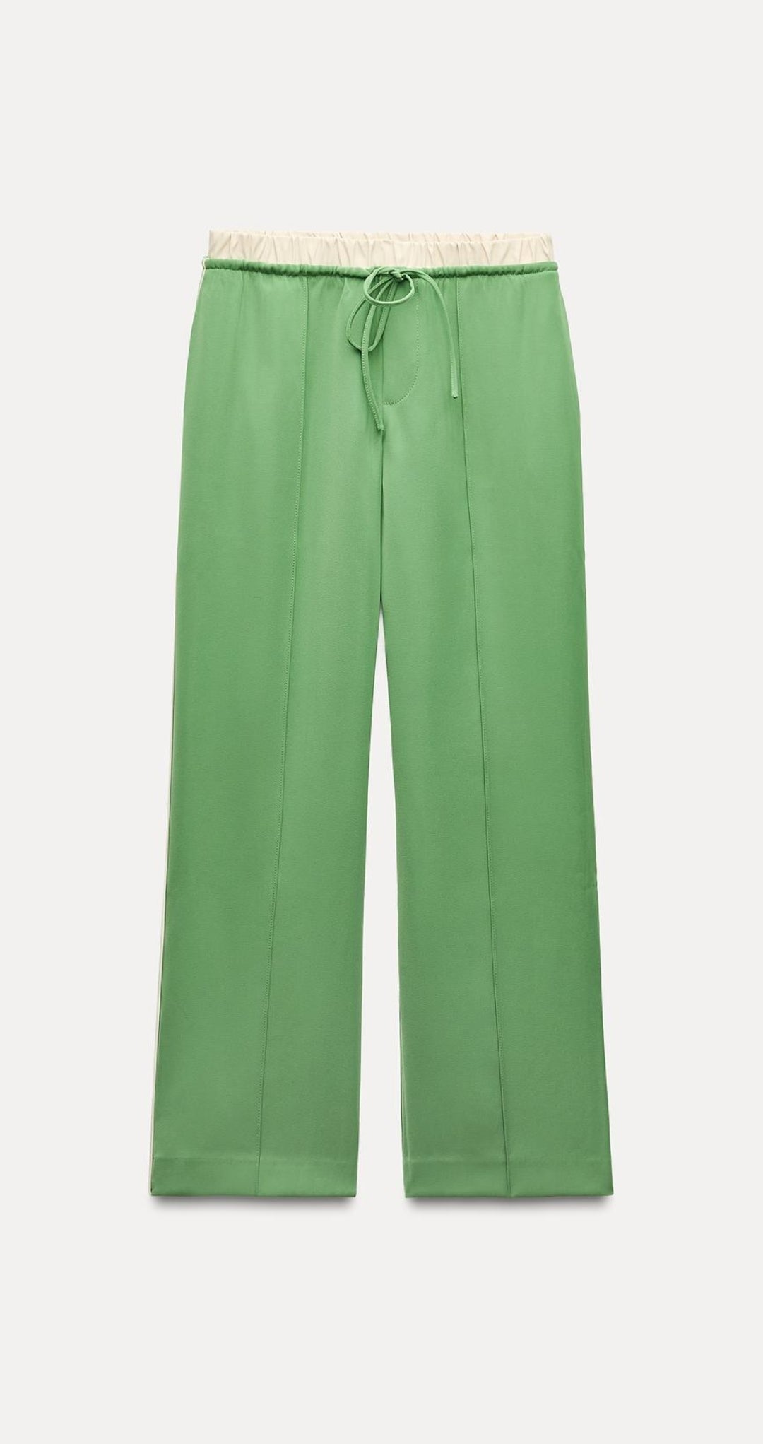Draw string trousers with side pipping